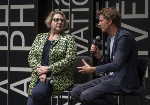 Due relatori sul palco di Alpha Innovation Live 2026 al NOI Techpark di Bolzano